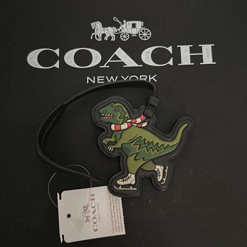 NWT Coach cf087 Rexy Skate Bag Charm In Signature Canvas Dinosaur Winter Leather